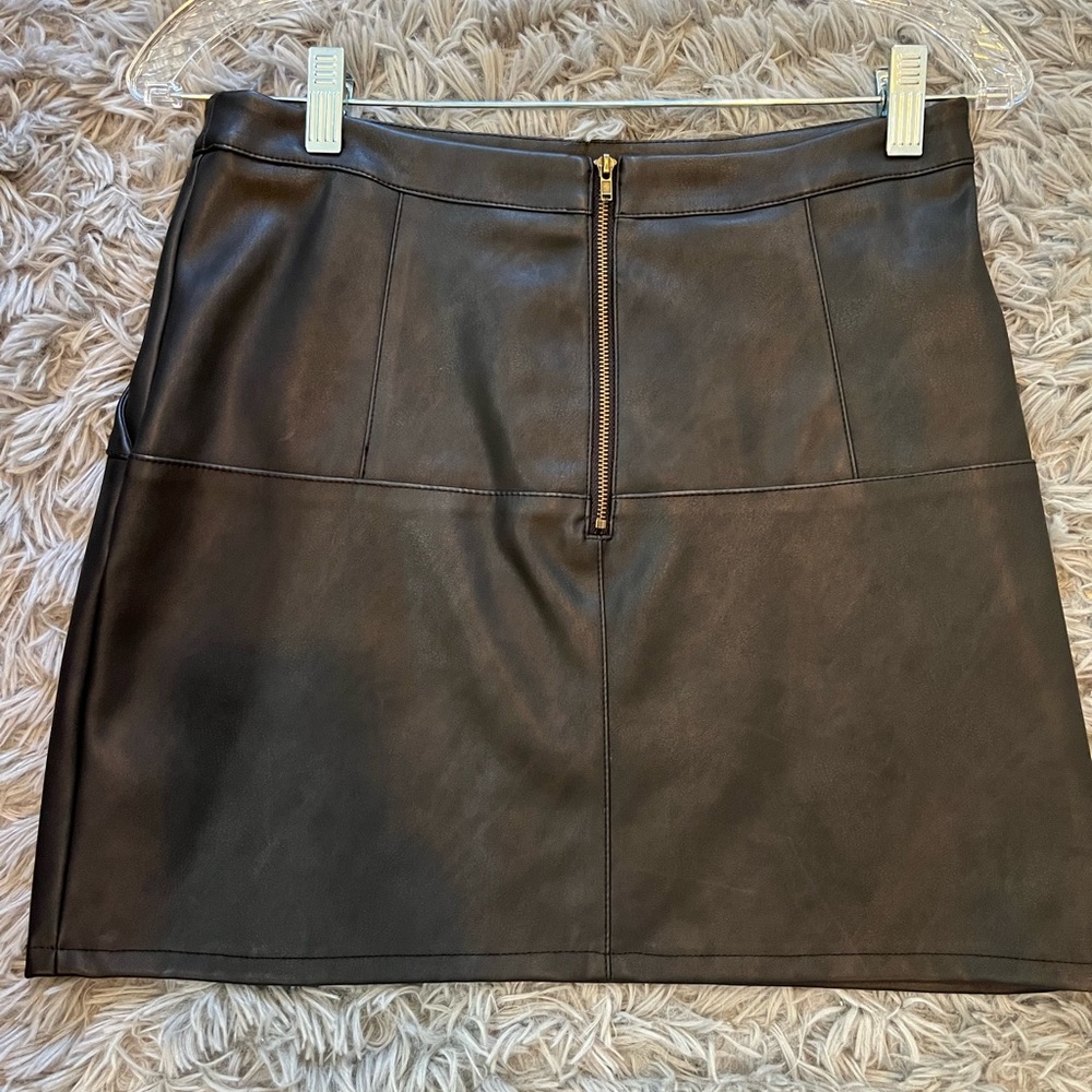 Black leather skirt with tags.